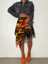 Faldas midi asimétricas con patchwork de malla